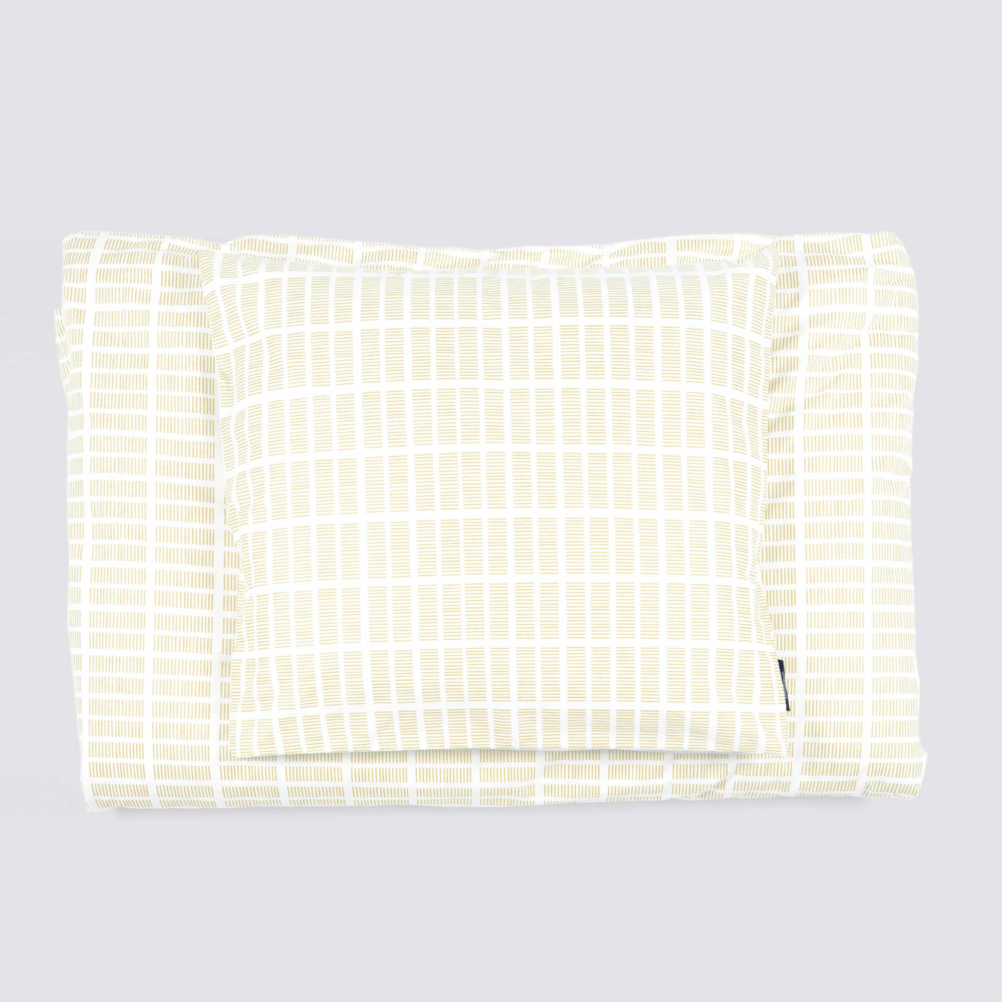 Sengetøj, økologisk bomuld, Tile mellow yellow, foldet bunke, RosenbergCph