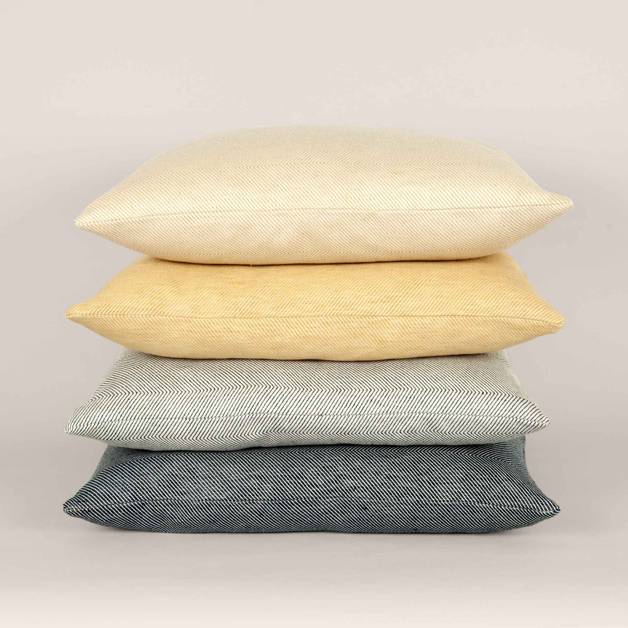 Square cushions in linen/cotton herringbone weave, design by Anne Rosenberg, RosenbergCph