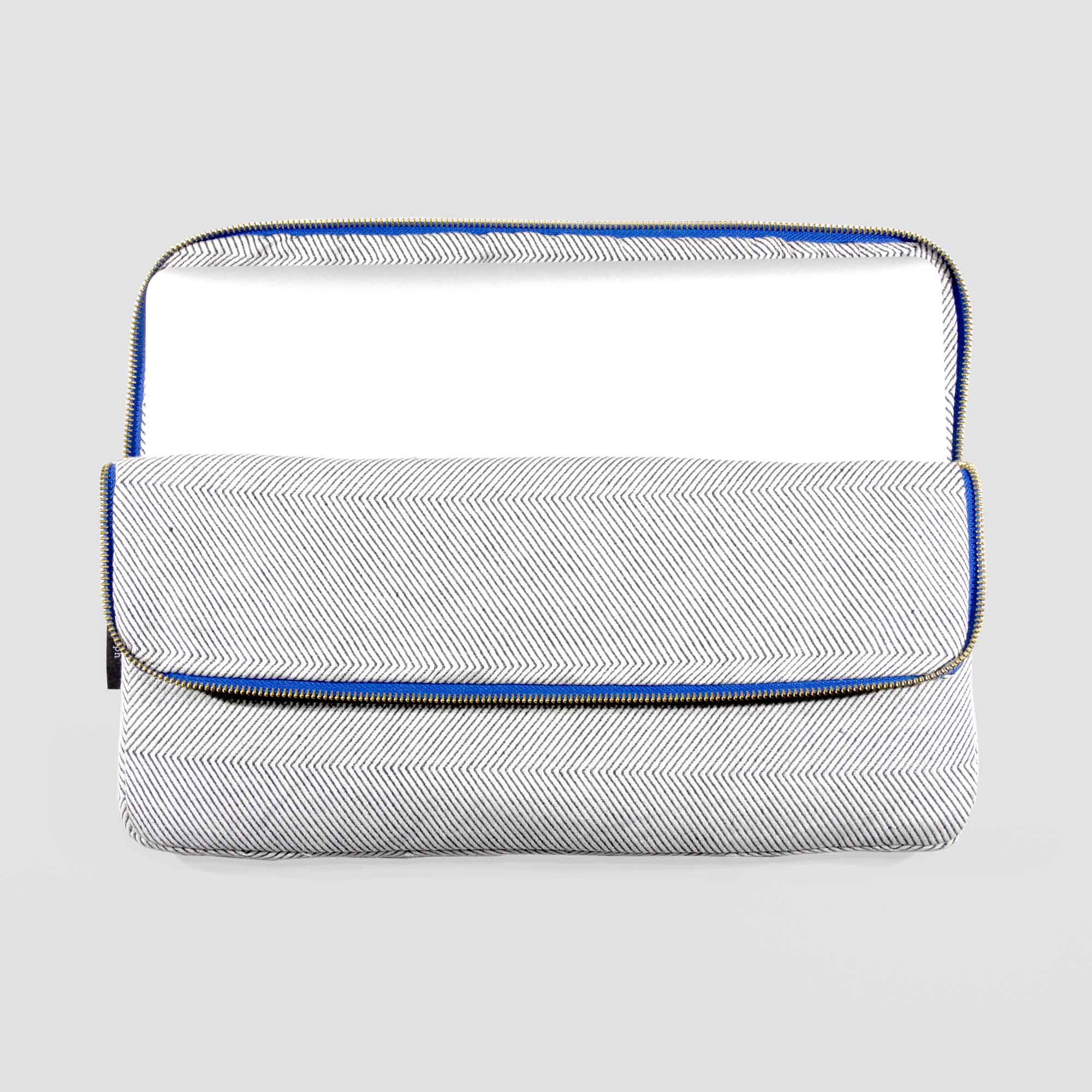 Escape laptop sleeve in light blue herringbone weave, design by Anne Rosenberg, RosenbergCph